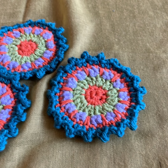 Hand crocheted Mandala coasters in dark teal, orange, violet and green - Picture 2 of 5